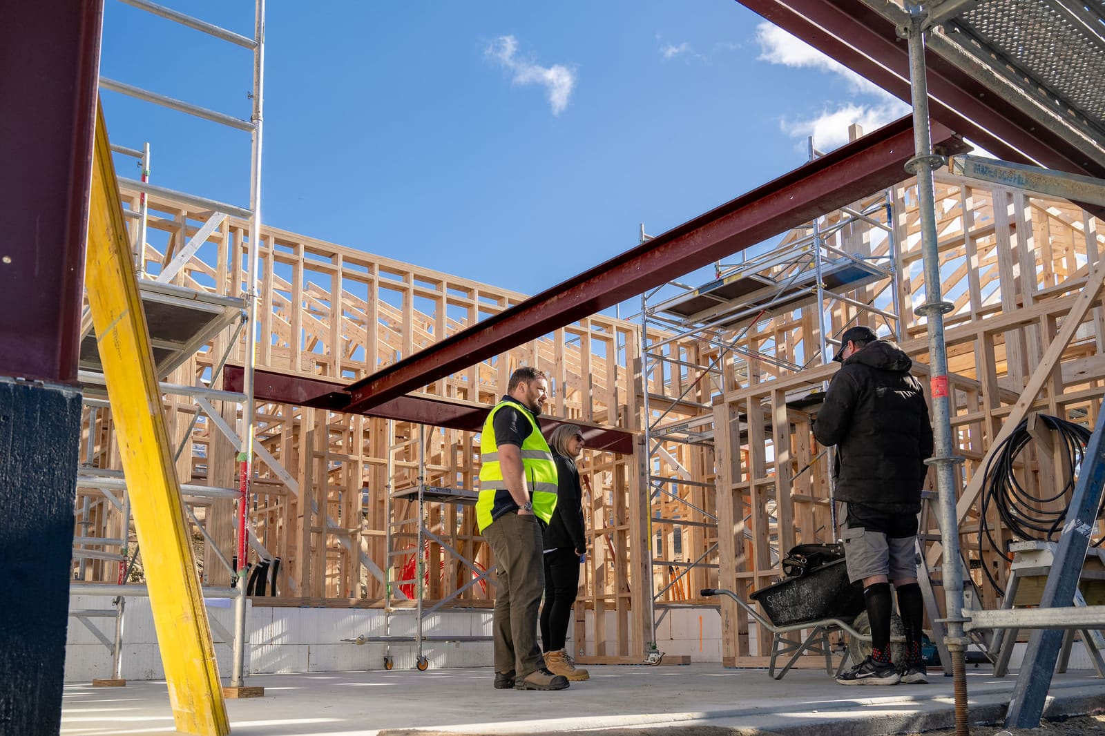 Contractors working on a timber-framed building in New Zealand
