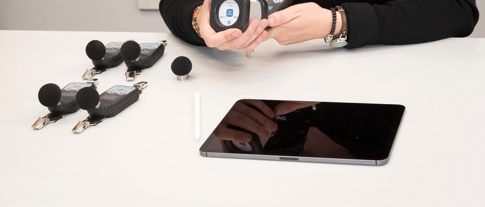 Survey data captured digitally on a tablet beside a sampling pump