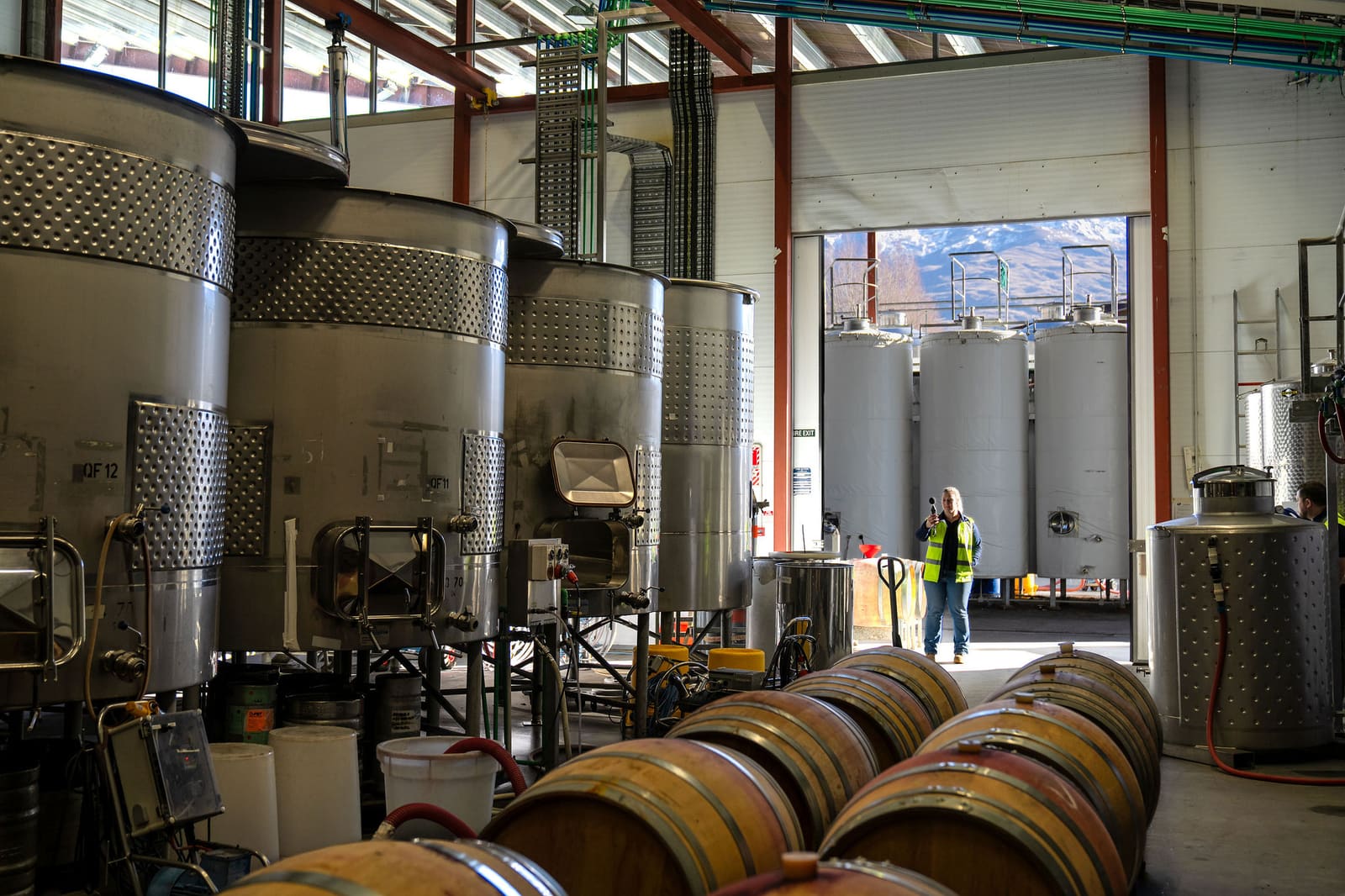 Industrial hall with process tanks — the kind of space with no coverage
